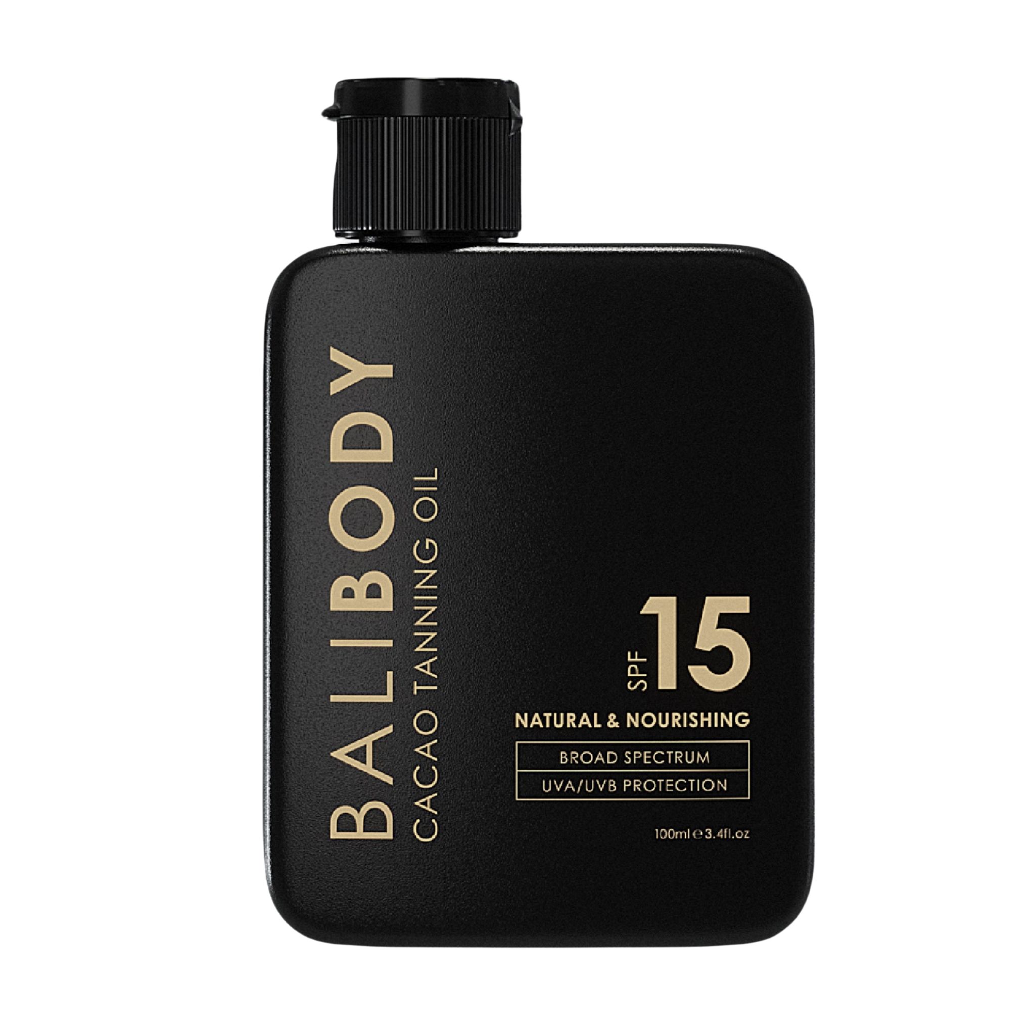 Flacone nero con testo dorato: BALIBODY, CACAO TANNING OIL, SPF 15. Contiene informazioni sulla protezione naturale e la protezione UVA/UVB.