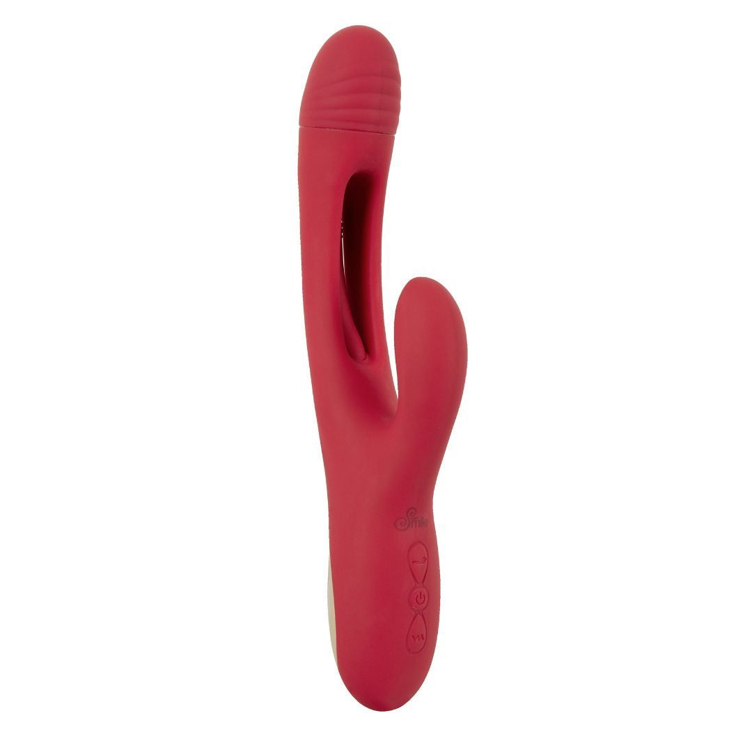 Roter Vibrator mit gebogener Form und Zungenfunktion. Oberteil mit Rillen, Unterteil mit Bedienknöpfen.