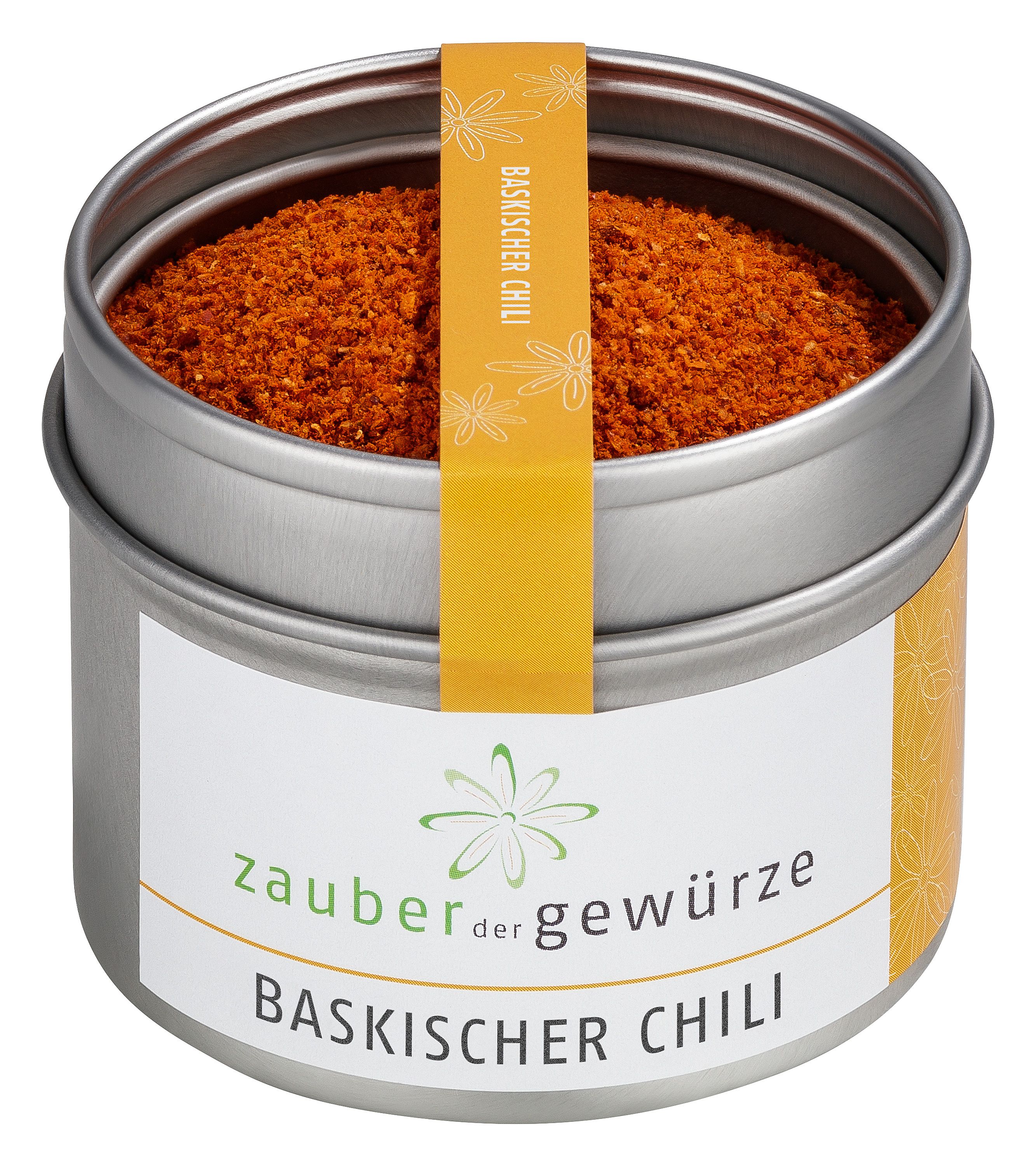 Runde Dose mit Baskischem Chili. Etikett mit Logo und Schriftzug. Gelber Aufkleber mit Produktname. Dose geöffnet, Inhalt sichtbar.