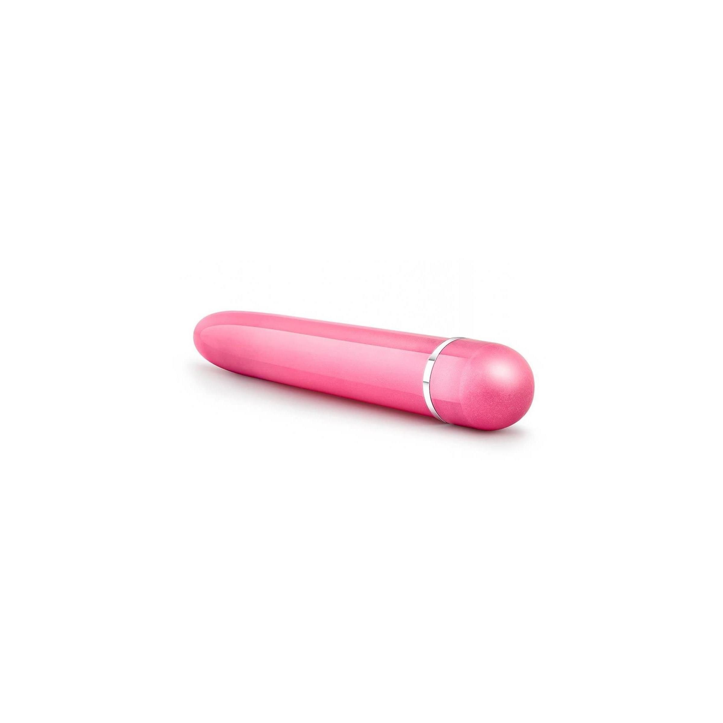 Rosa Vibrator. Zylindrische Form mit abgerundeten Enden. Silberfarbener Ring am Ende.