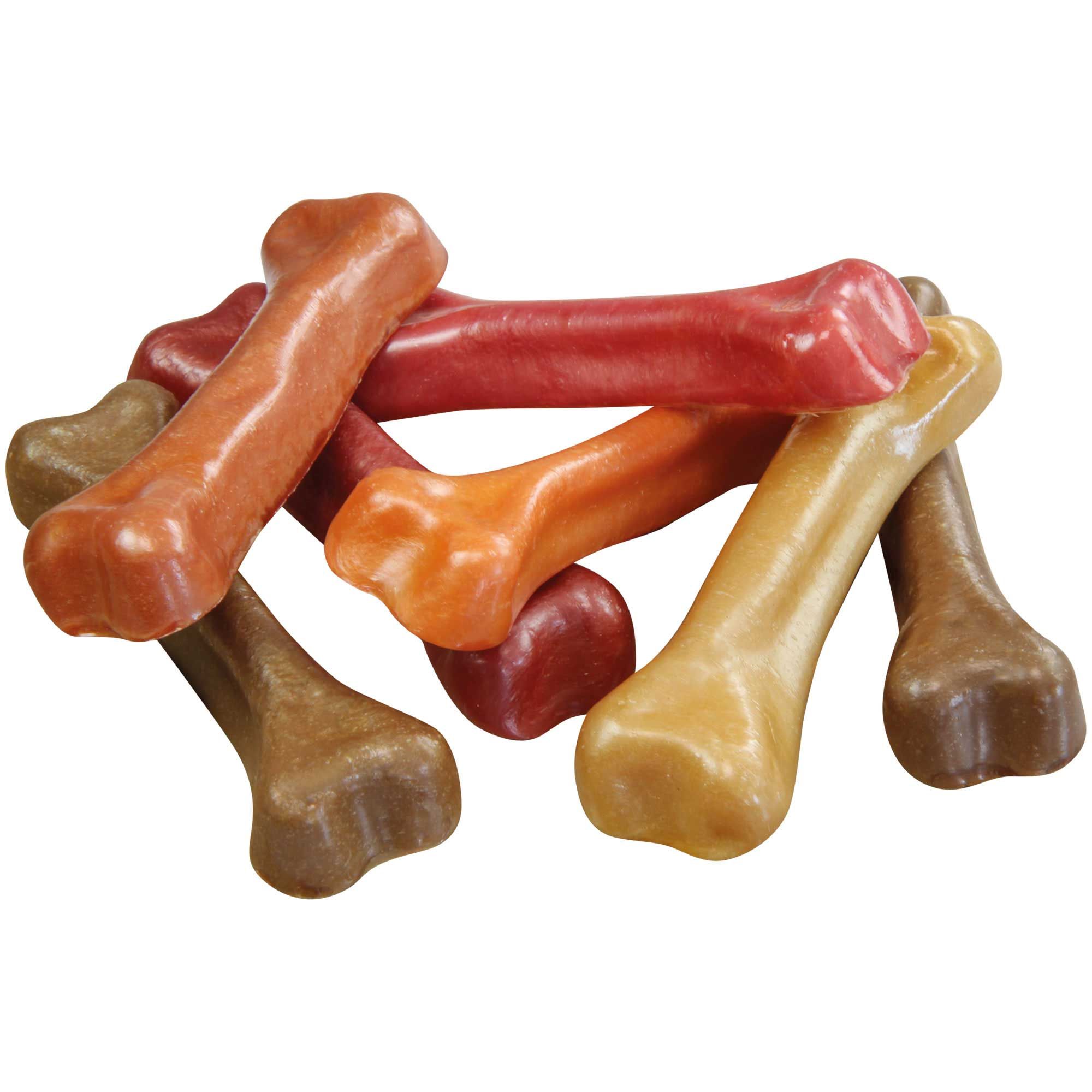 Haufen von Kauknochen in verschiedenen Farben. Knochenförmig, mit abgerundeten Enden. Farben: gelb, orange, rot und braun.