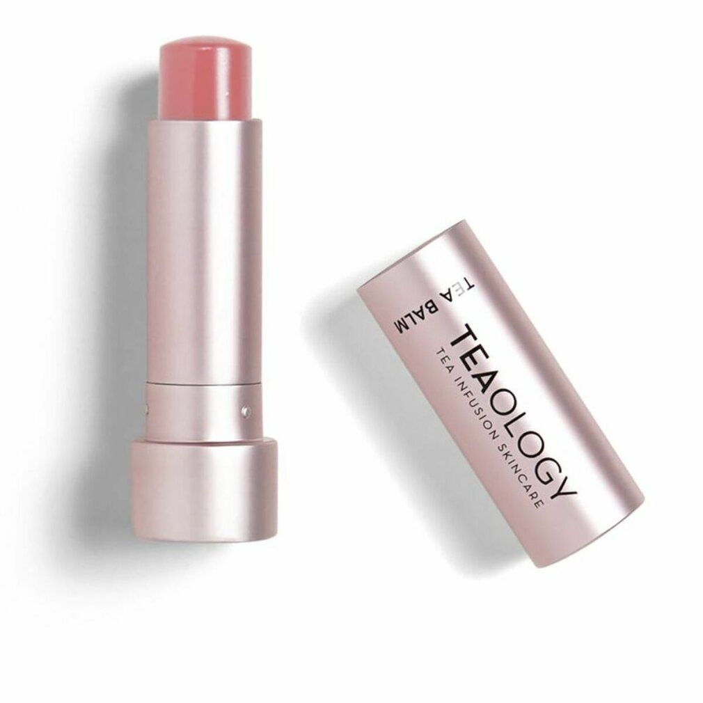 Lippenbalsam in rosa Hülse. Deckel mit Schriftzug TEAOLOGY. Offener Balsam zeigt rosa Spitze.