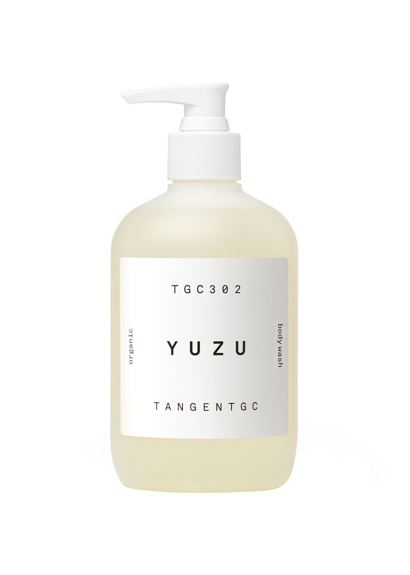 Körperwaschmittel-Flasche mit Spender. Aufschrift: YUZU, TANGENT GC, organic, body wash. Weiße Pumpe, cremefarbene Flüssigkeit.