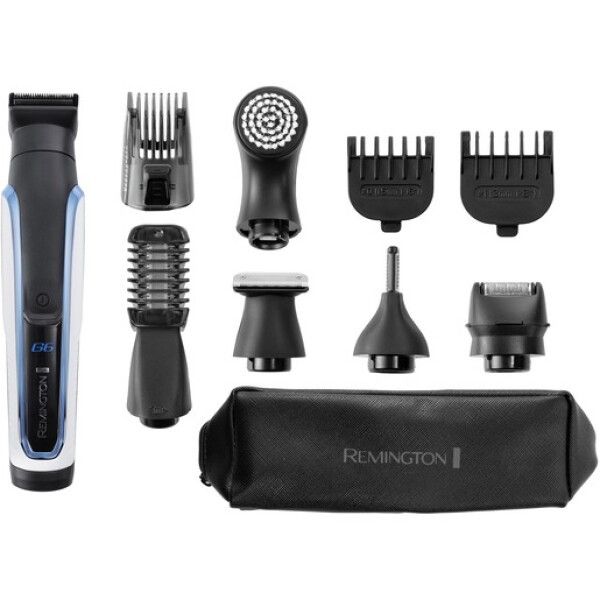 Haarschneider-Set mit Zubehör. Enthält Trimmer, Aufsätze, Reinigungsbürste und Etui. Marke: Remington.