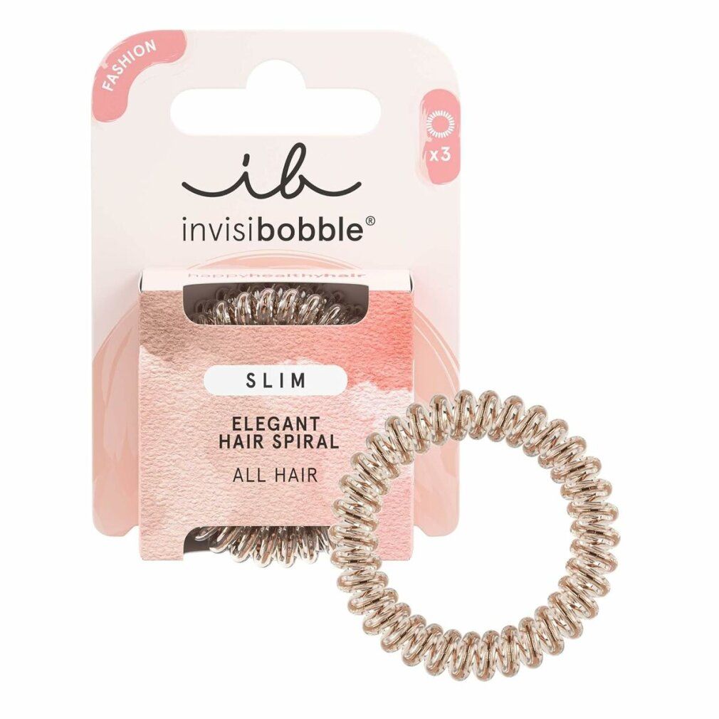 Verpackung mit drei Haargummis in Spiralform. Marke: invisibobble. Farbe: Bronze. Text: SLIM, Elegant Hair Spiral.