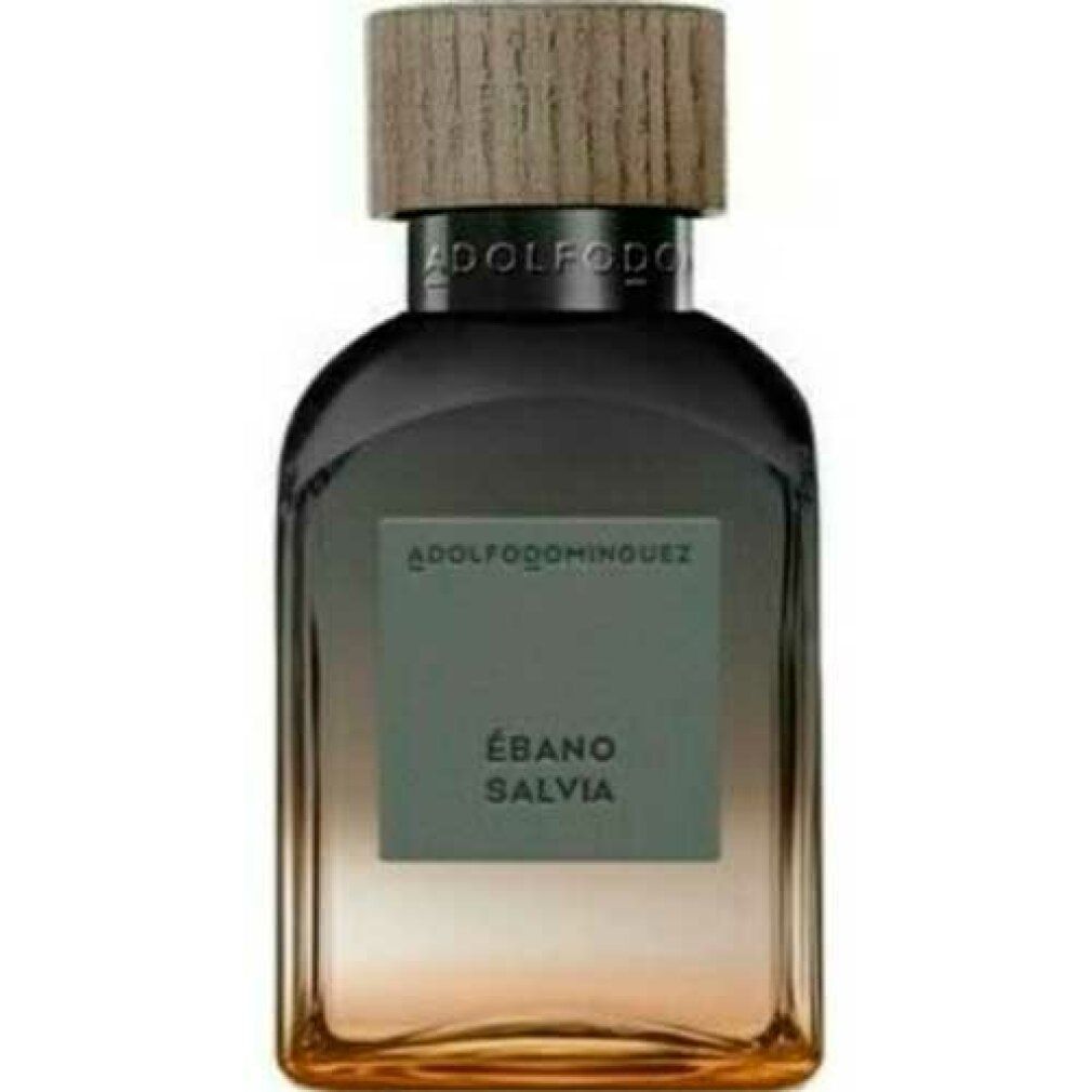 Parfümflasche mit Holzverschluss. Aufschrift: ADOLFODOMINGUEZ, ÉBANO SALVIA. Farbverlauf von Braun zu Gold.