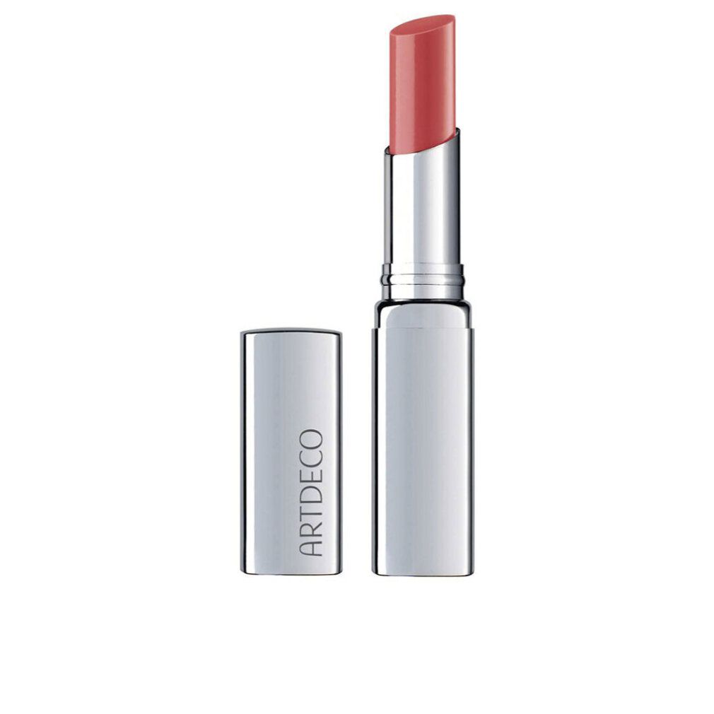 Lippenbalsam mit geöffneter Kappe. Silberfarbene Hülse, rosafarbene Lippenstiftspitze. Auf der Hülse steht "ARTDECO".