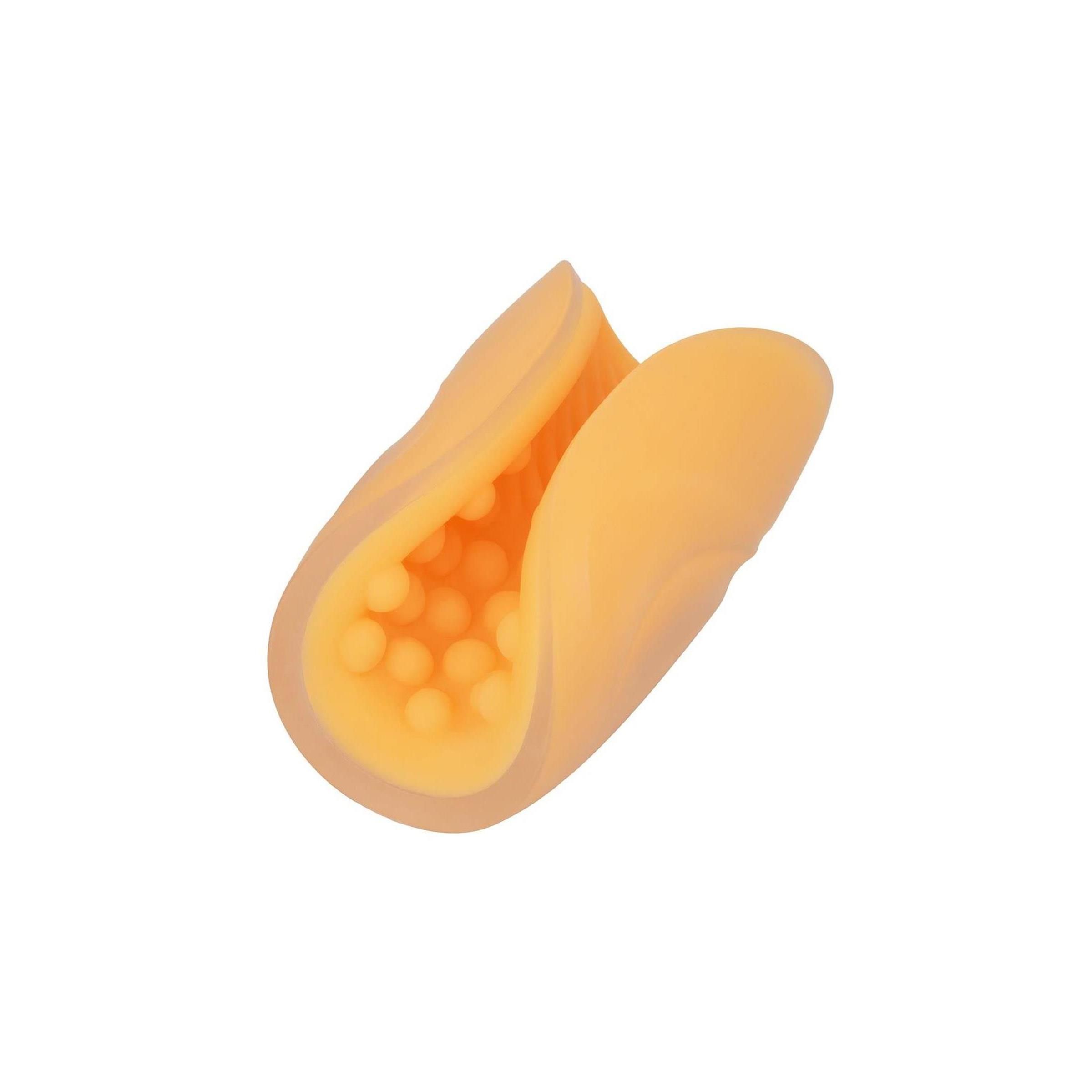 Gelbes, offenes Produkt mit genoppter und geriffelter Innenseite. Die Form ist oval.