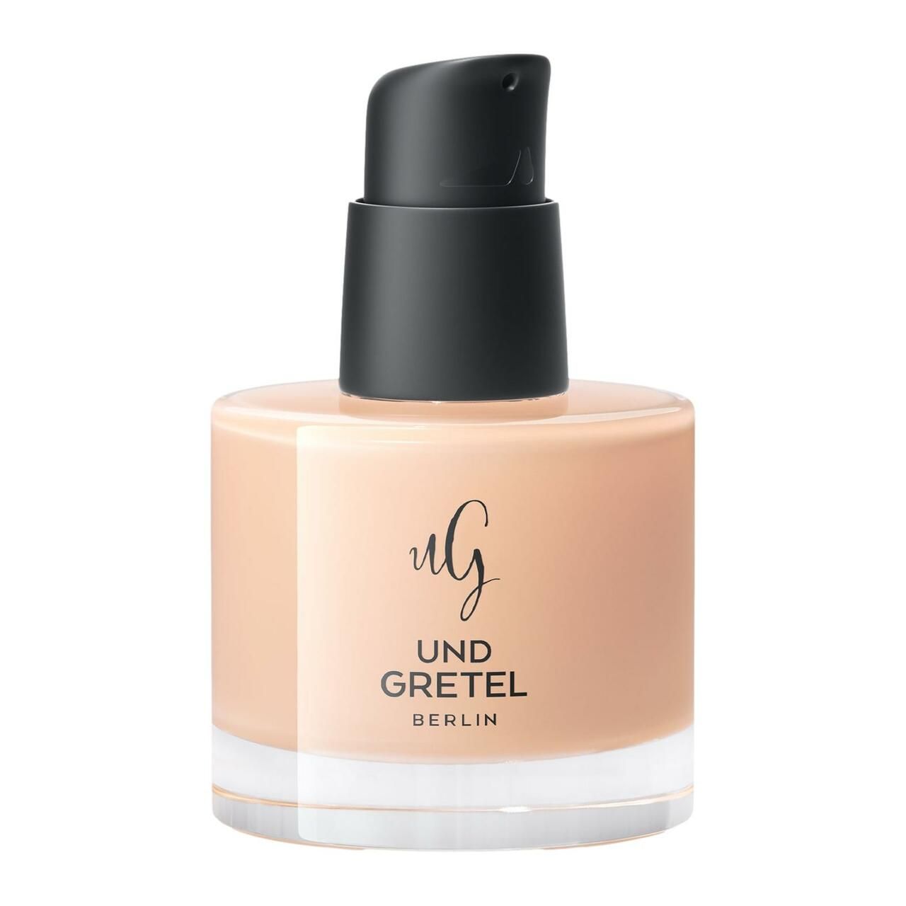 Beige Creme-Flakon mit schwarzem Pumpverschluss. Schriftzug: Und Gretel Berlin.