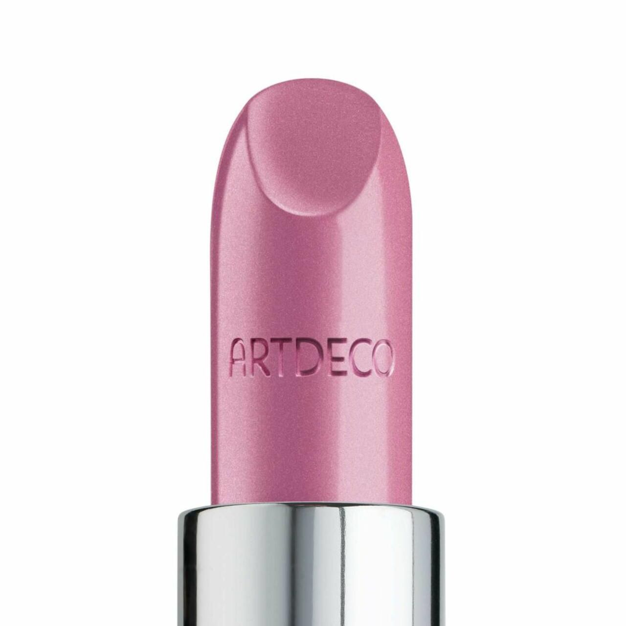 Nahaufnahme eines rosafarbenen Lippenstifts. Der Name ARTDECO ist eingraviert.