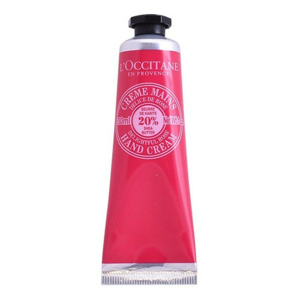Rosa Handcreme-Tube mit schwarzem Deckel. Text: L'Occitane, Crème Mains, Delice de Rose, 20% Shea Butter.