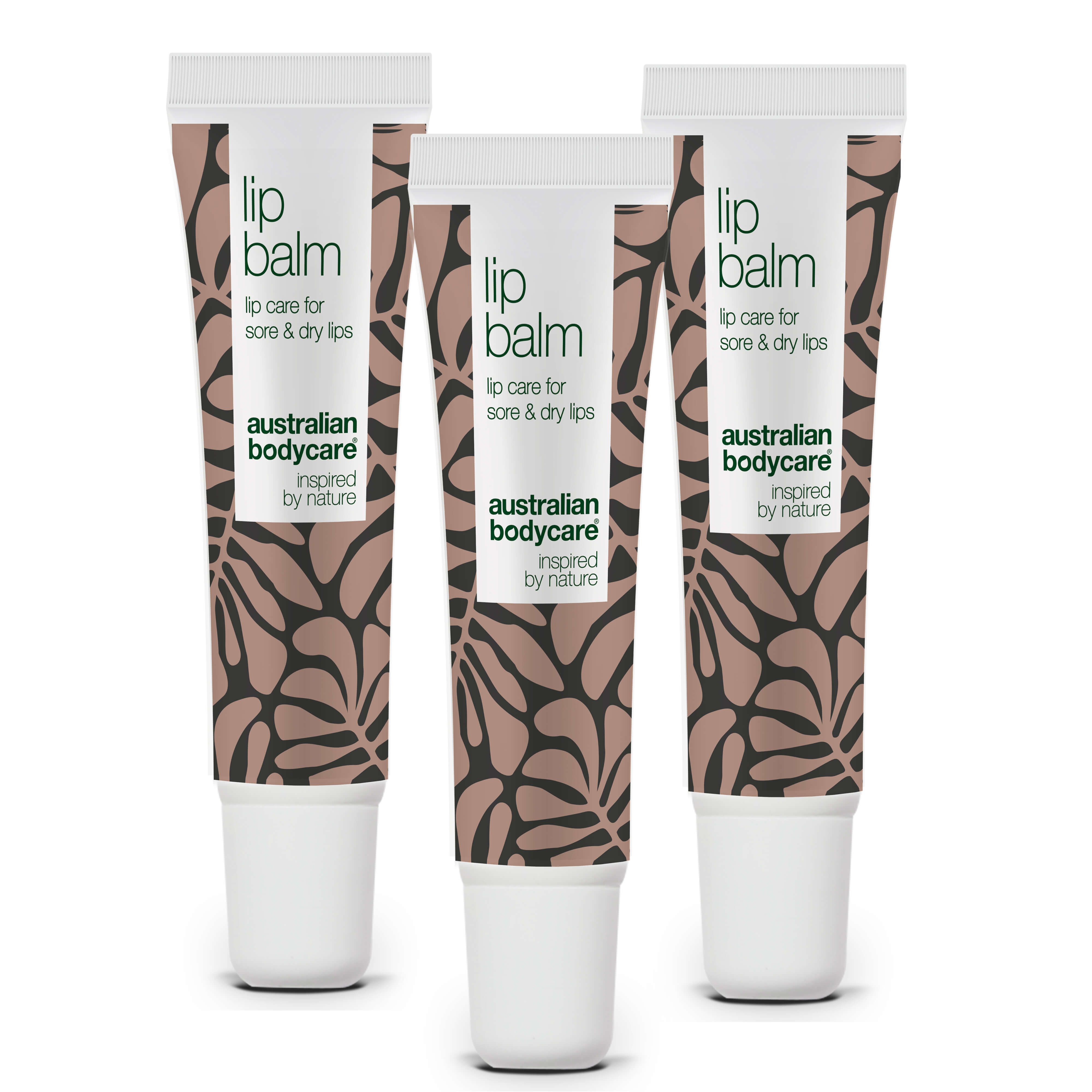 Drei Tuben Lippenbalsam. Weißer Deckel, braunes Muster, Text: Lip Balm, Australian Bodycare.