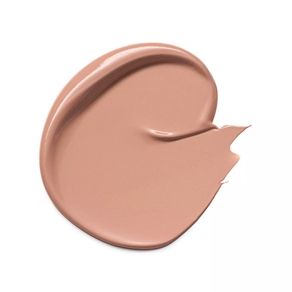 Ausgestrichene Concealer-Probe in Beige. Die Textur ist matt.