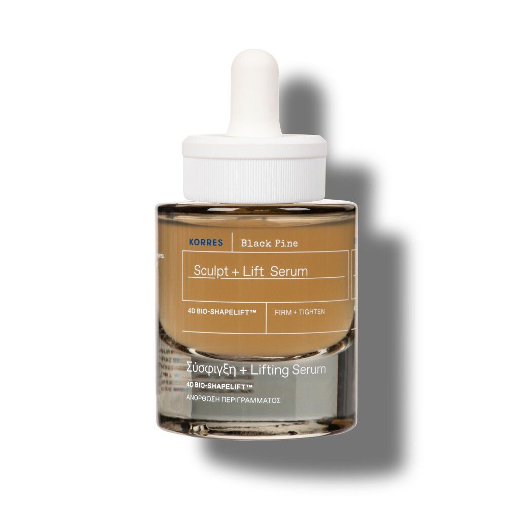 Korres Black Pine Sculpt + Lift Serum in Glasflasche mit Pipette, leicht schattiert.