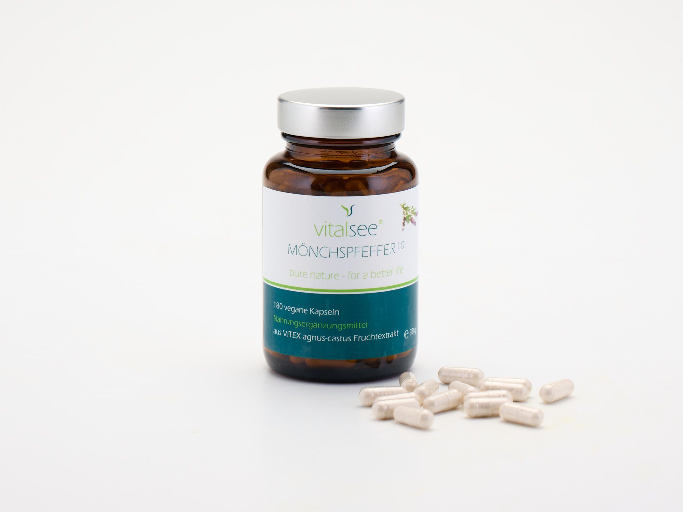 Braune Glasflasche mit silbernem Deckel und Kapseln daneben. Aufschrift: Vitalsee MÖNCHSPFEFFER 10. 180 vegane Kapseln.