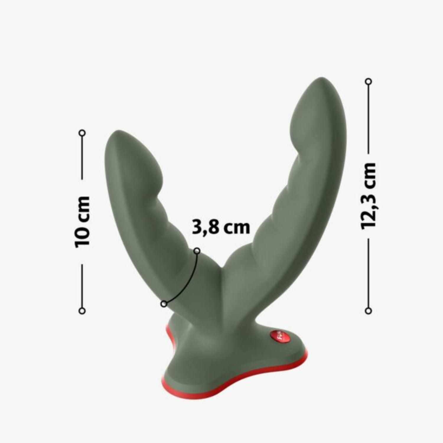 Grüner Doppeldildo mit rotem Sockel. Abmessungen: 10 cm, 12,3 cm, 3,8 cm. Das Produkt hat eine wellenförmige Oberfläche.