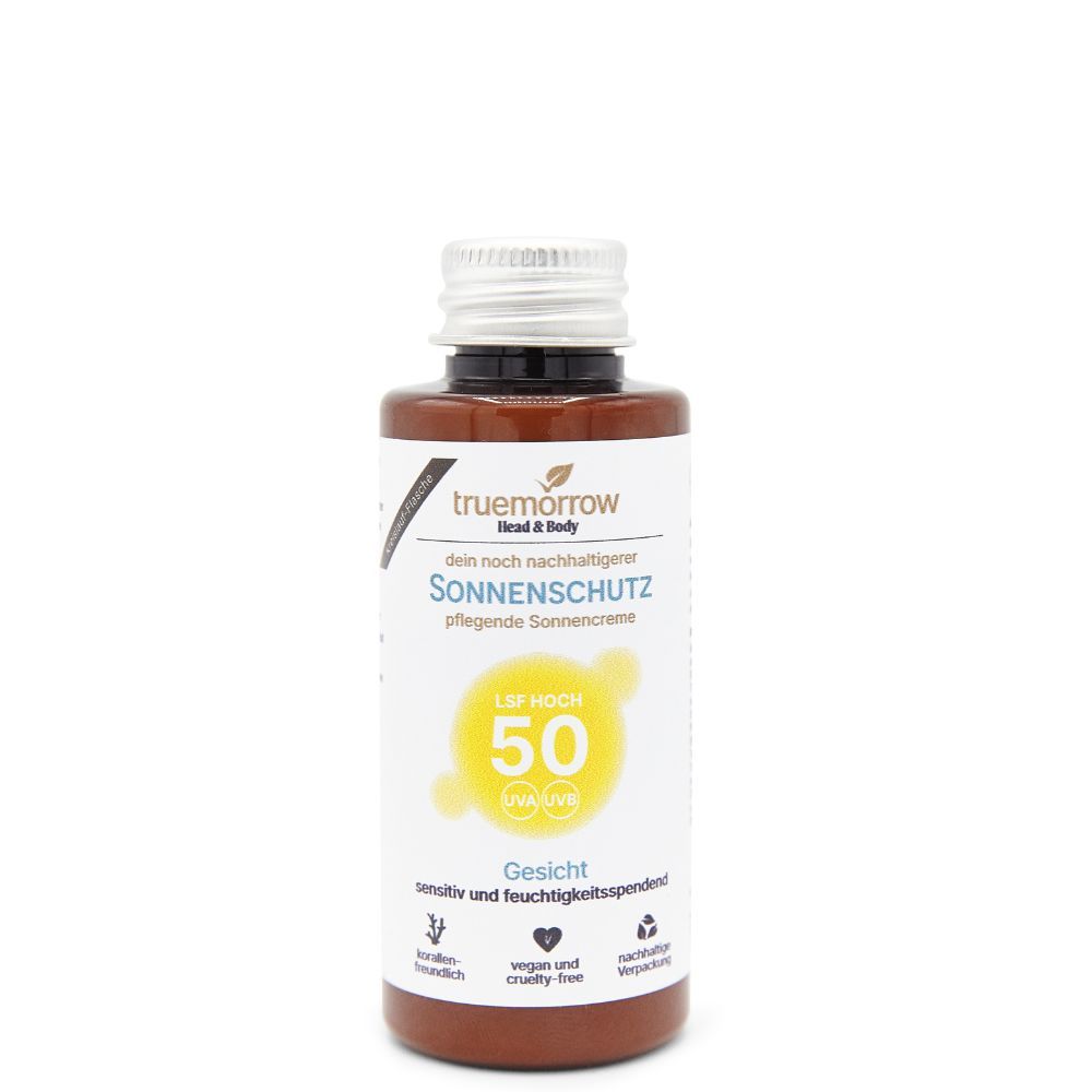 Braune Flasche mit silbernem Deckel. Aufschrift: Sonnenschutz LSF 50 für das Gesicht. Vegan und tierversuchsfrei.