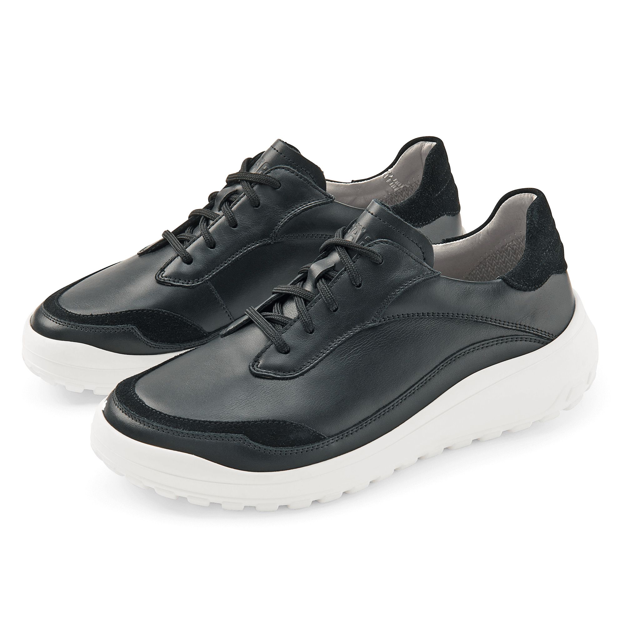 Schwarze Damen-Schnürschuhe aus Leder mit weißer Sohle und Wildleder-Akzenten.