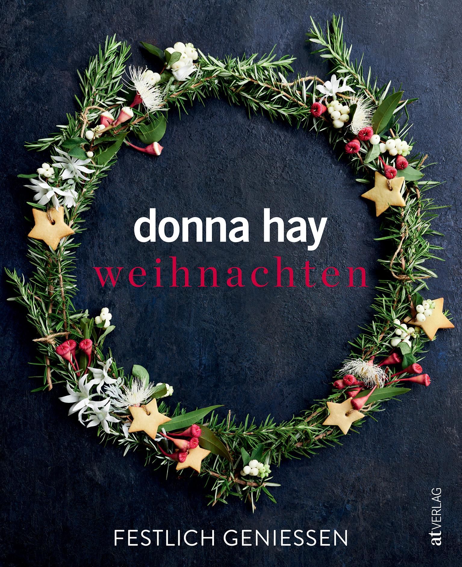 Buchcover mit Kranz aus Grün, Sternen und Blüten. Titel: donna hay weihnachten. Untertitel: Festlich geniessen. Verlag: atverlag.
