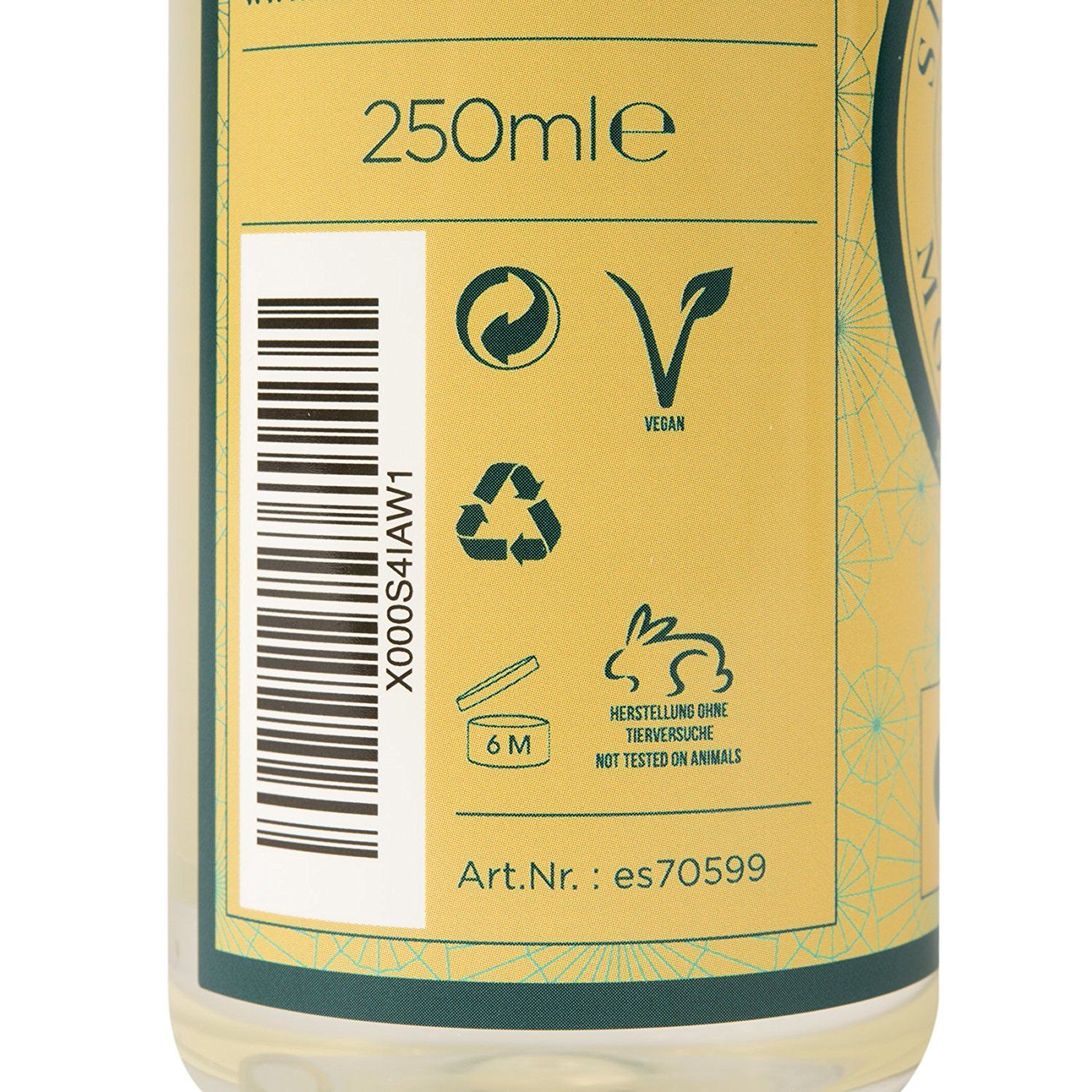 Nahaufnahme des Etiketts. Aufschrift: 250ml, Vegan-Siegel, Recycling-Symbol, 6M-Symbol, Hinweis: Tierversuchsfrei. Artikelnummer.