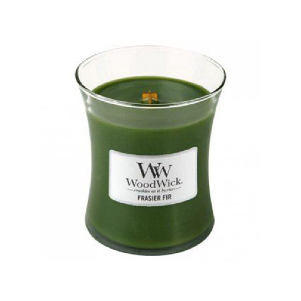 Sanduhrförmige Kerze mit grünem Wachs. Auf dem Etikett steht WoodWick und Frasier Fir. Glasbehälter mit Holzdocht.