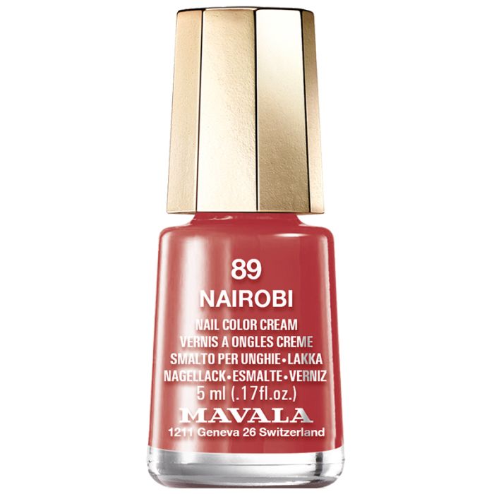 Nagellackflasche, rotbraune Farbe. Goldfarbener Deckel. Aufschrift: Nairobi, 5 ml, Mavala.
