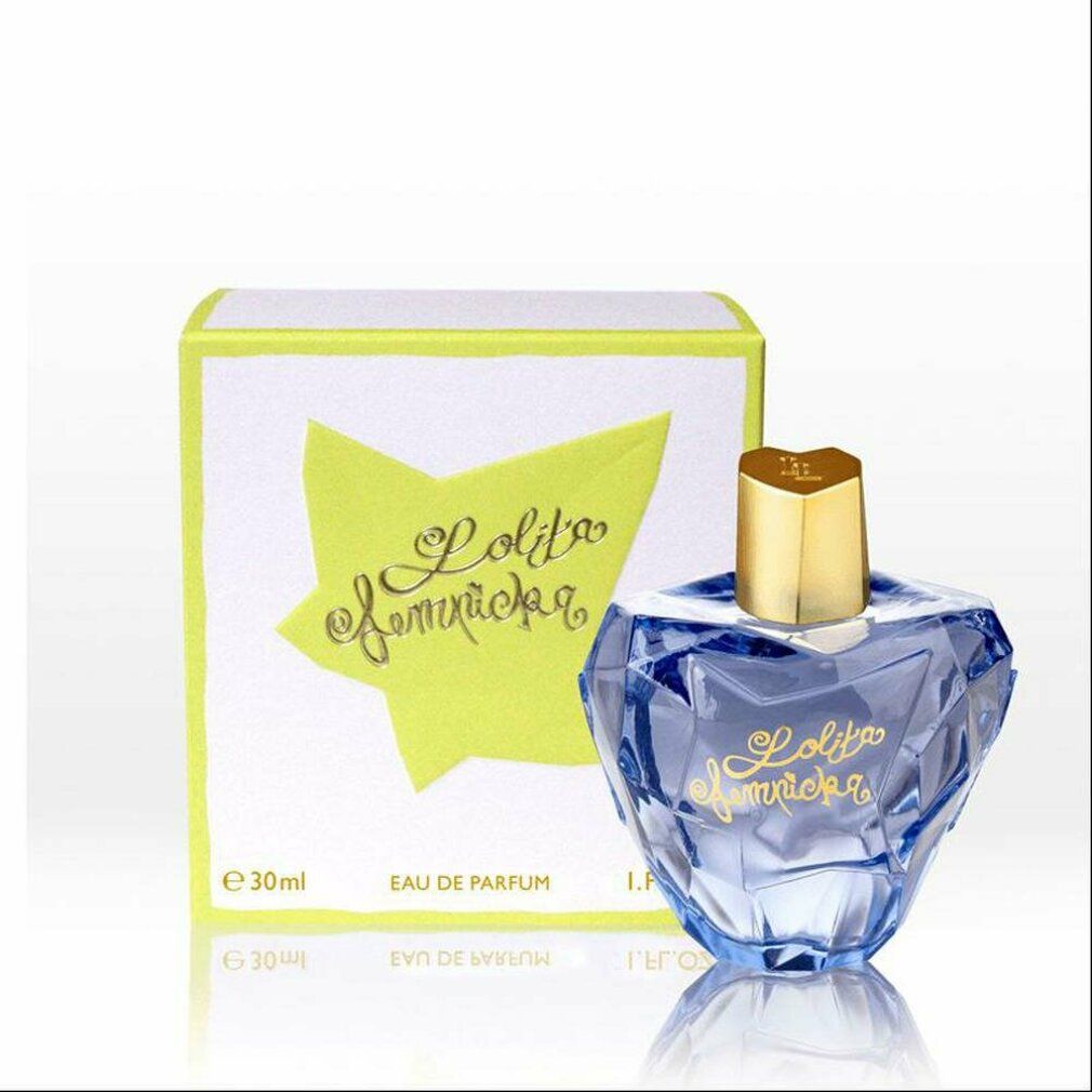 Flakon und Verpackung. Flakon blau, goldener Deckel, goldene Schrift "Lolita Lempicka". Verpackung gelb-weiß.