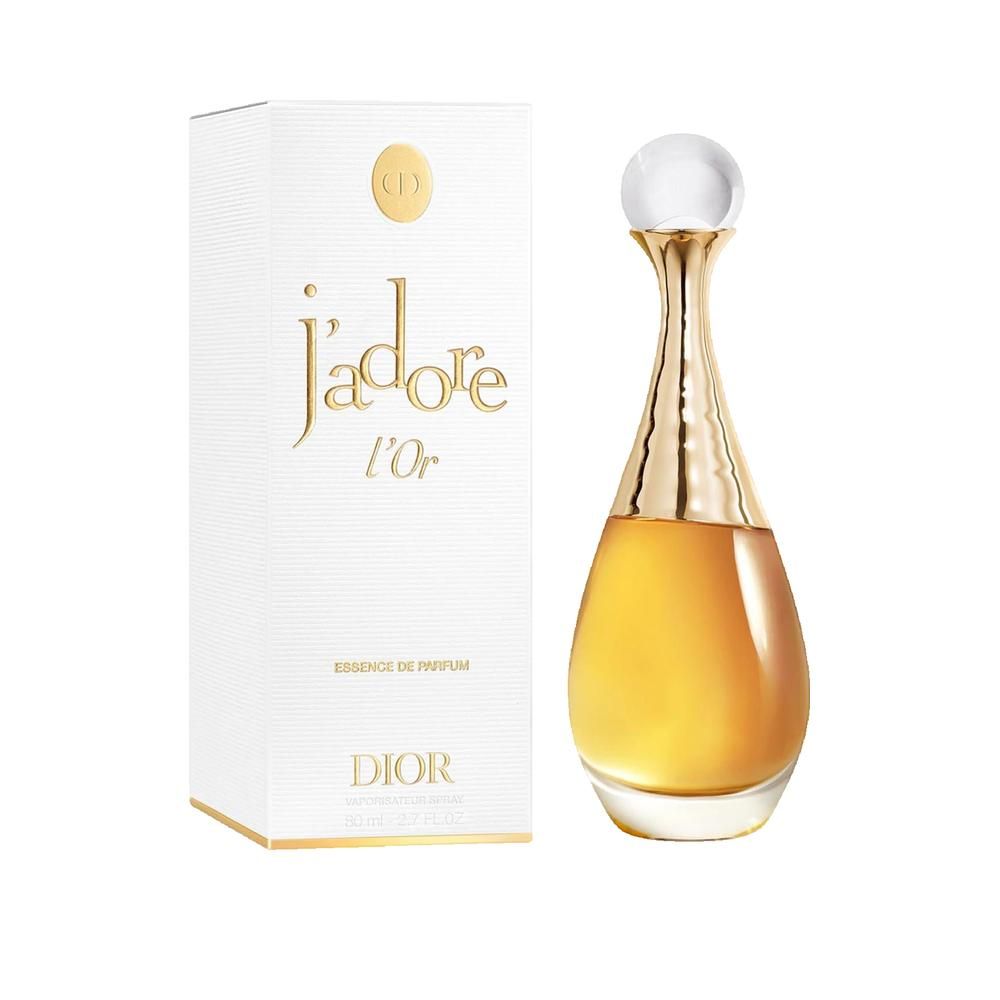 Parfümflakon und Verpackung. Flakon goldfarben, tropfenförmig, mit Kappe. Verpackung weiß mit goldener Schrift: J'adore l'Or, Dior.