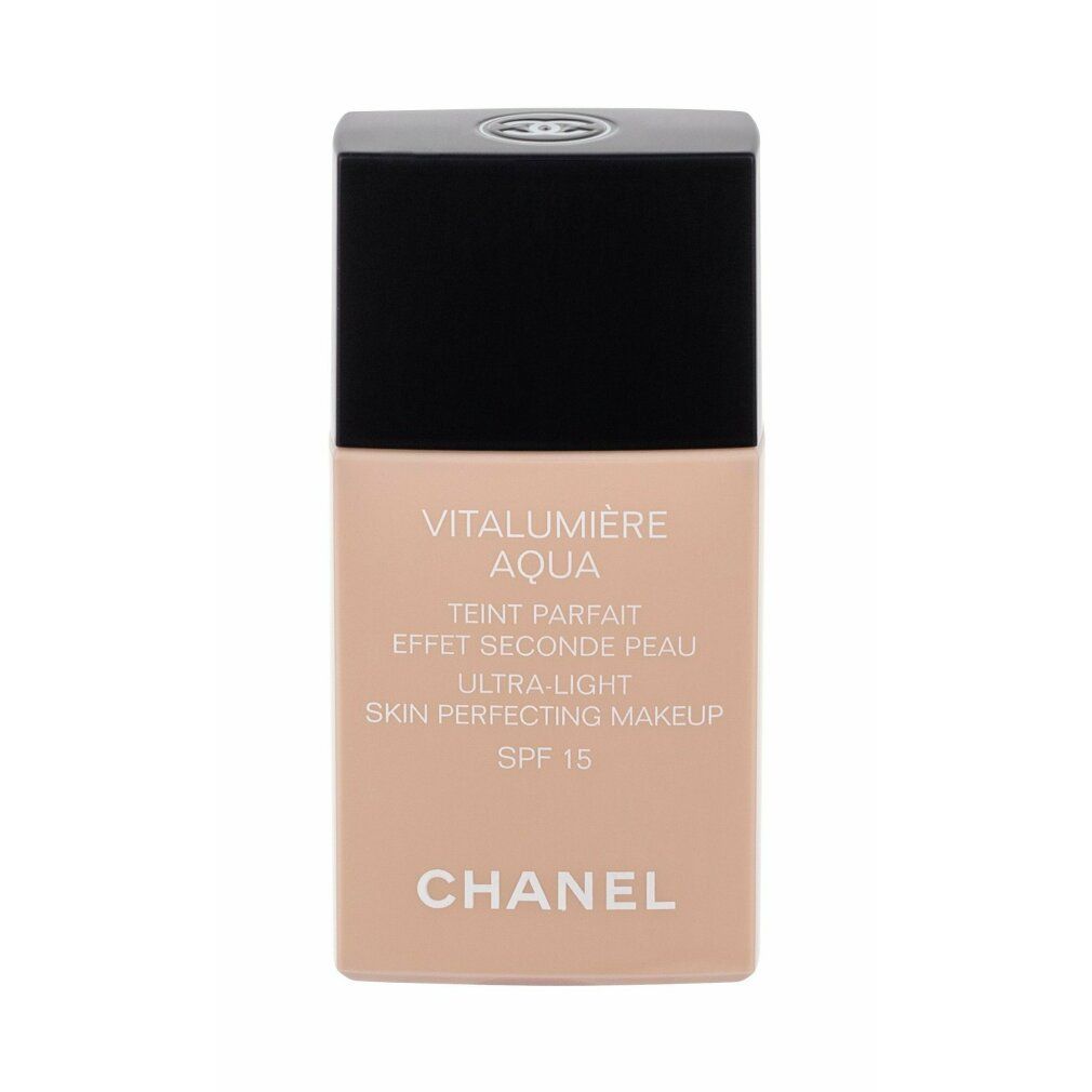Chanel Vitalumiere Aqua Make up SPF 15 Nr.70 Beige. Beige Flasche mit schwarzem Deckel. Text: Vitalumiere Aqua, SPF 15, Chanel.