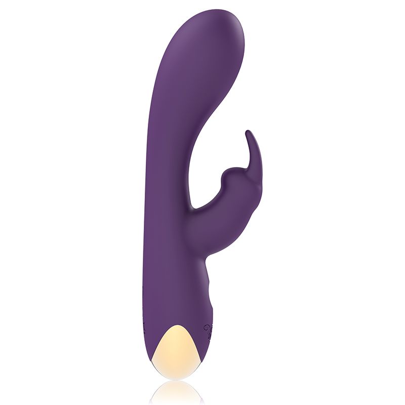 Lila Rabbit Vibrator. Ergonomisches Design mit gebogener Form und Kaninchenohren. Goldfarbener Bereich an der Basis.
