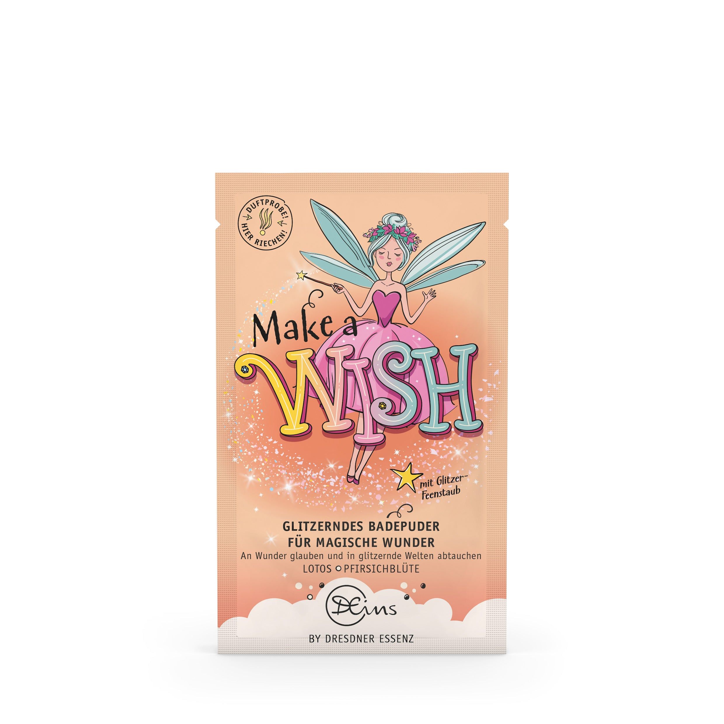 Roze badzoutzakje met opdruk. Opschrift "Make a Wish" en fee. Tekst: Glitterende badpoeder voor magische wonderen. Merk: Dresdner Essenz.