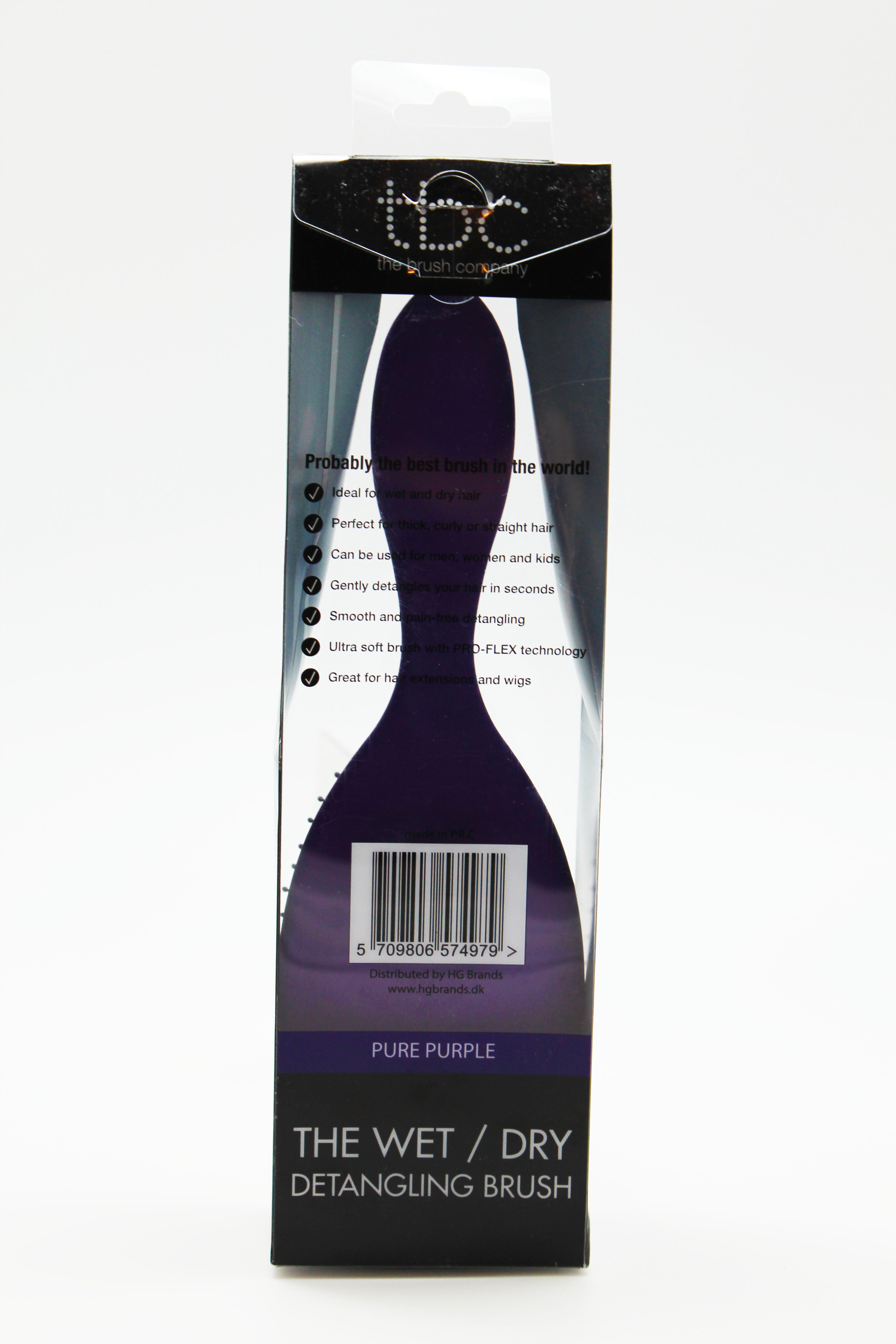Rückseite der Verpackung der lila TBC Wet & Dry Haarbürste mit Produktmerkmalen.
