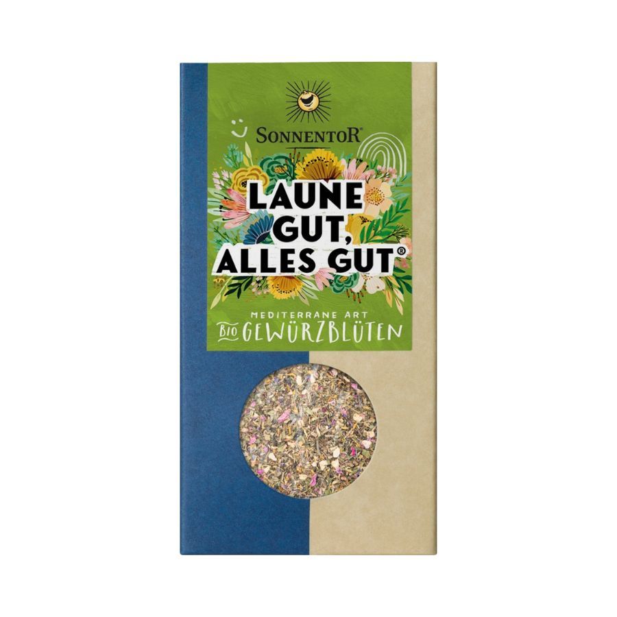 Verpackung mit Gewürzblüten. Oben steht "Sonnentor". Text: "Laune gut, alles gut". Unten: "Gewürzblüten Bio". Sichtfenster mit Inhalt.