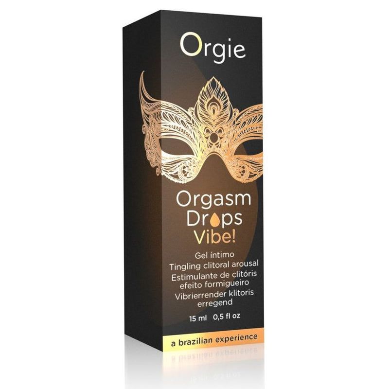 Schwarze Verpackung mit goldener Maske und Schriftzug 'Orgie Orgasm Drops Vibe!'. Text: 'Gel intimo' und 'a brazilian experience'.