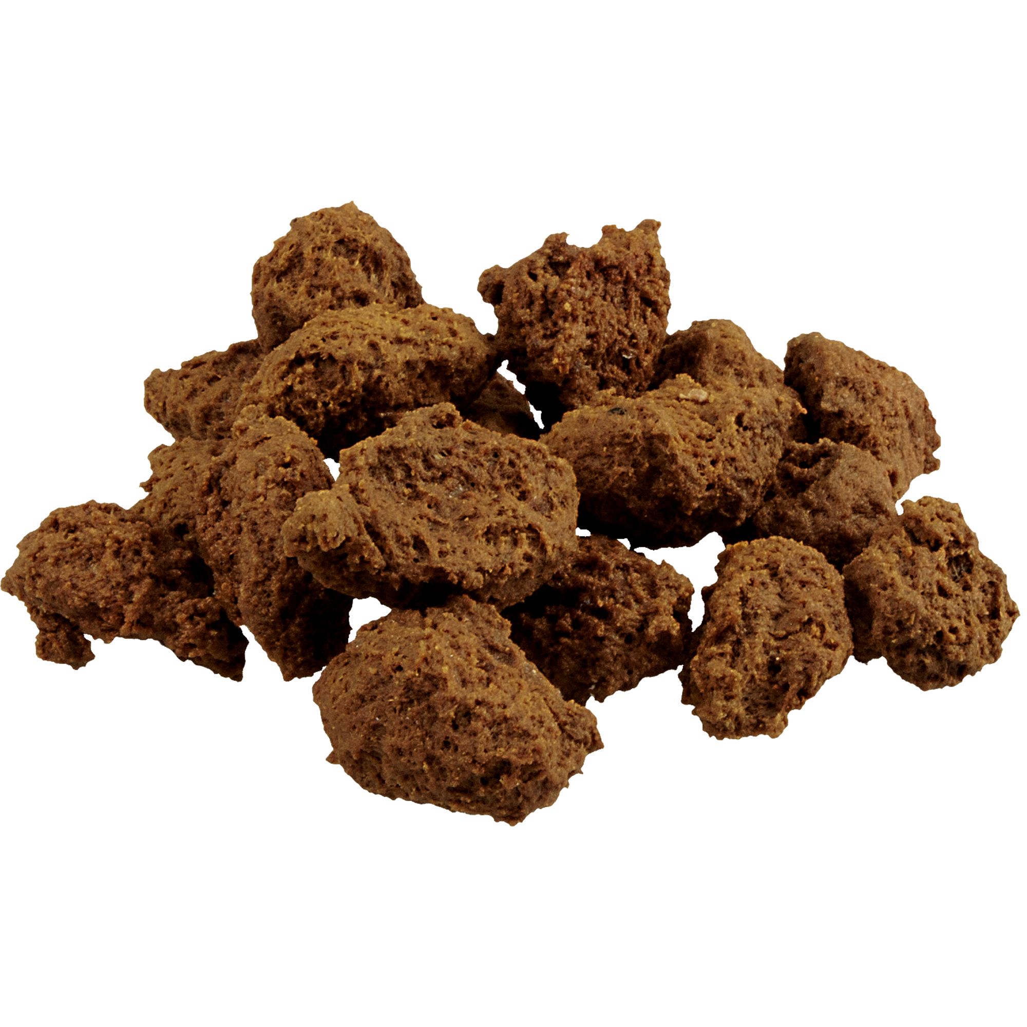 Haufen Hunde-Crossinies. Kroketten in unregelmäßiger Form und brauner Farbe.