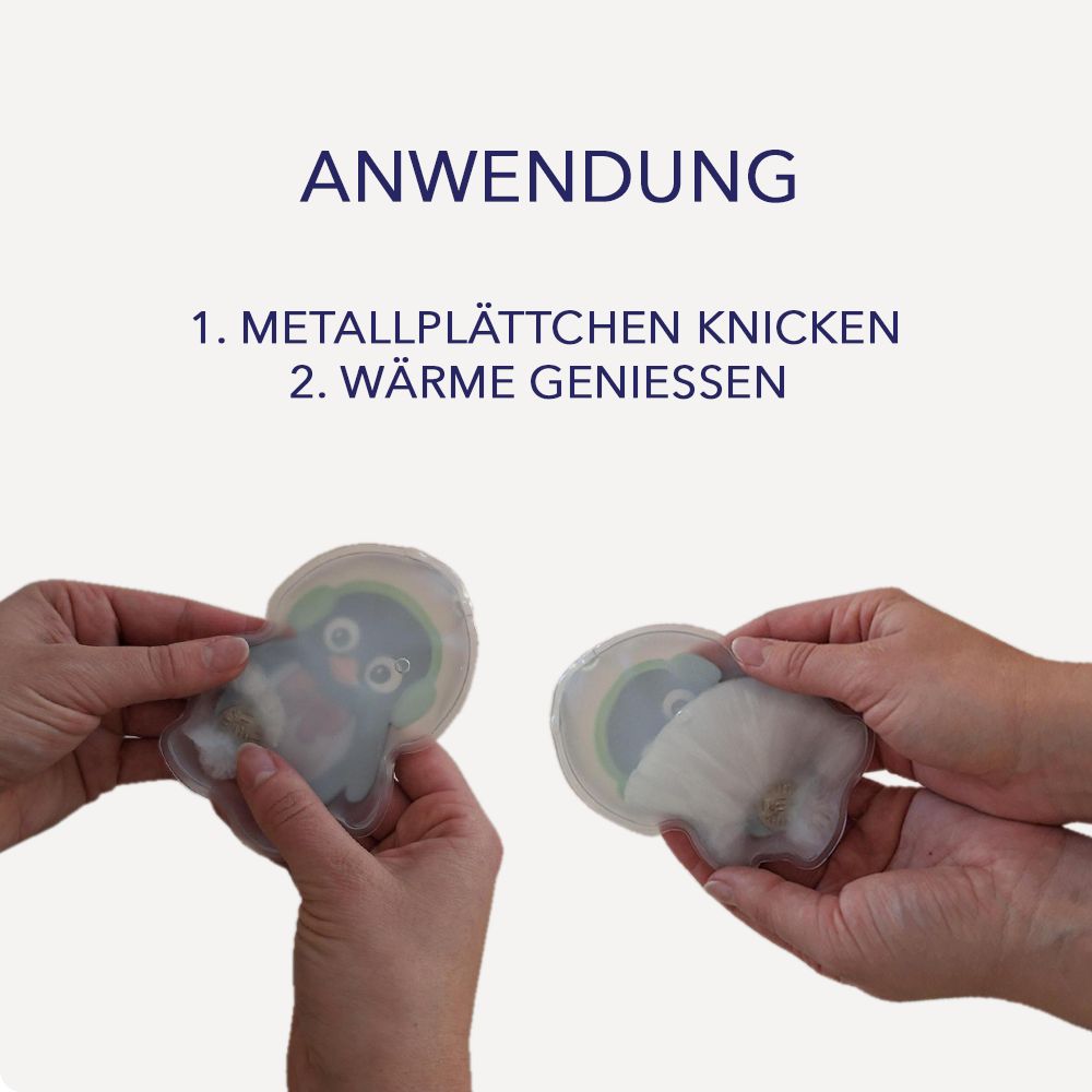 Hände halten zwei Handwärmer in Pinguin-Form. Text: Anwendung. 1. Metallplättchen knicken. 2. Wärme genießen.