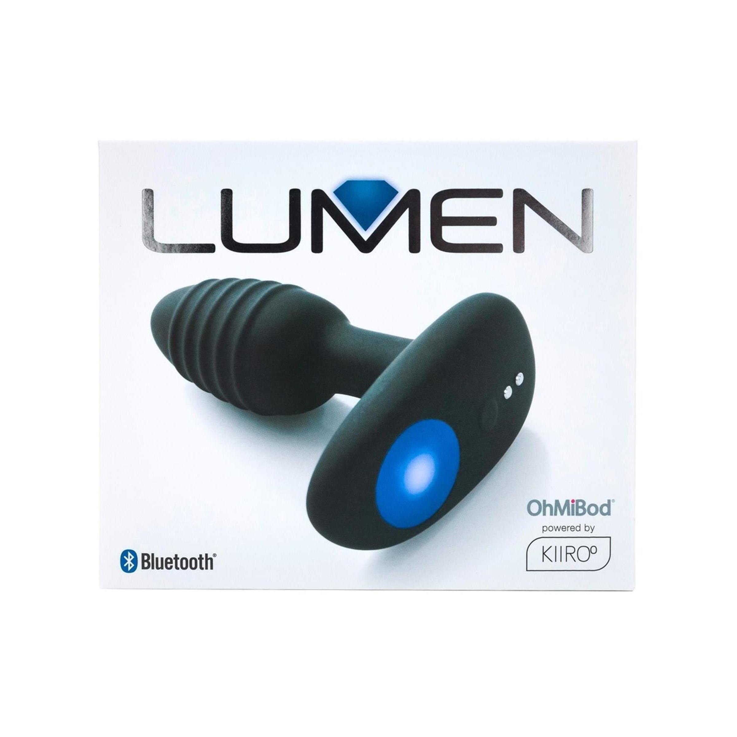 Verpackung mit dem Produkt. Auf der Verpackung steht "LUMEN" und "OhMiBod powered by Kiiroo".