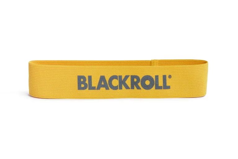 Gelbes BLACKROLL Loop Band mit Logo. Das Band ist rechteckig und liegt flach.