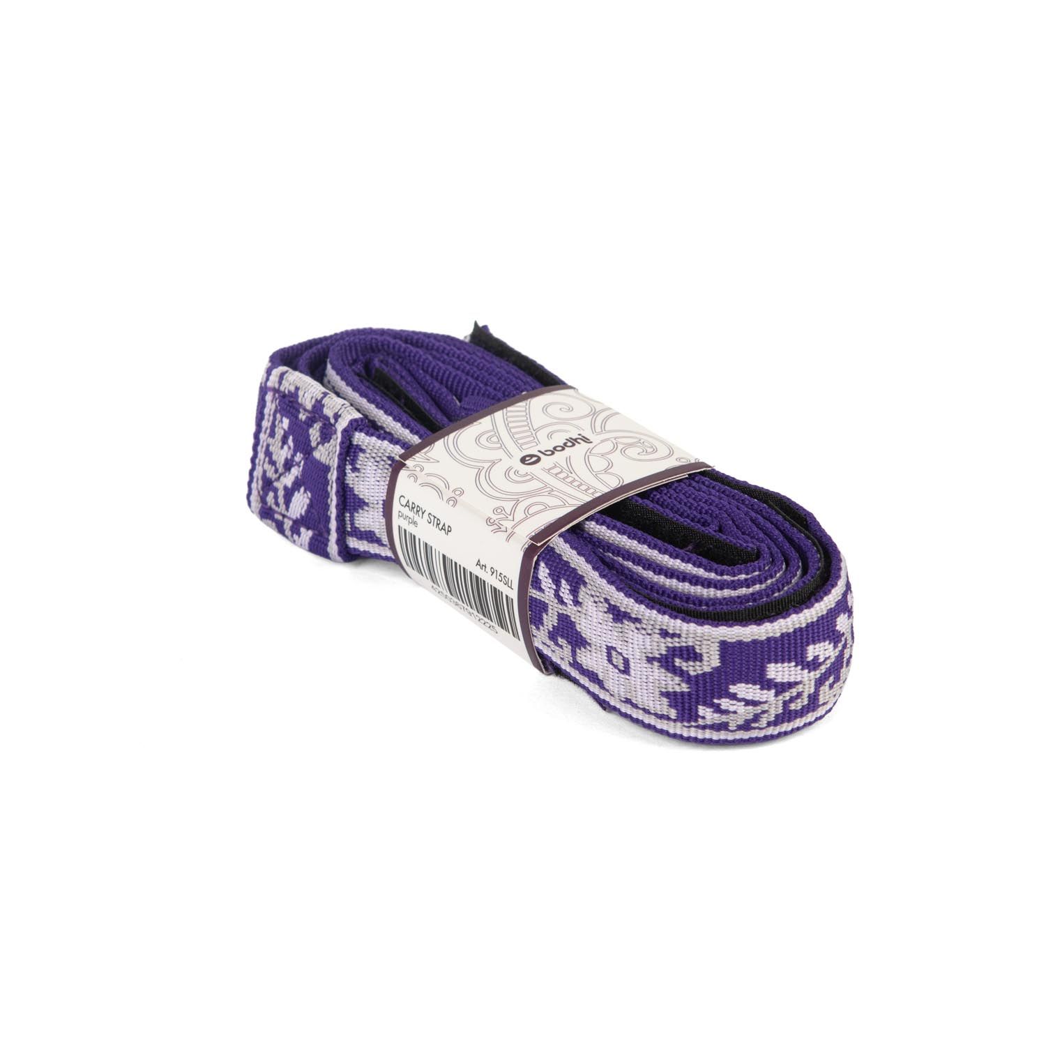 Lila Yogamatten-Tragegurt mit Muster. Aufgerollt und verpackt. Mit Etikett.