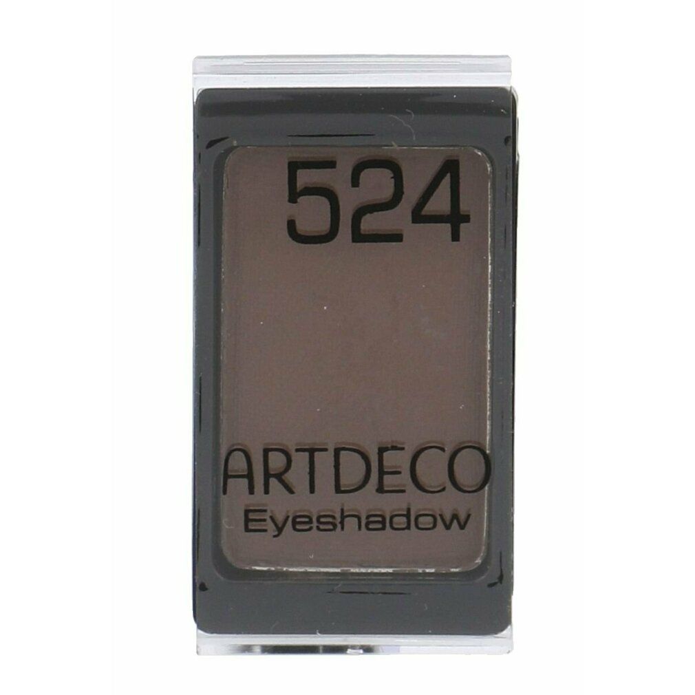 Dunkelbrauner Lidschatten in rechteckiger, schwarzer Hülle mit transparentem Deckel. Aufdruck: 524, ARTDECO Eyeshadow.
