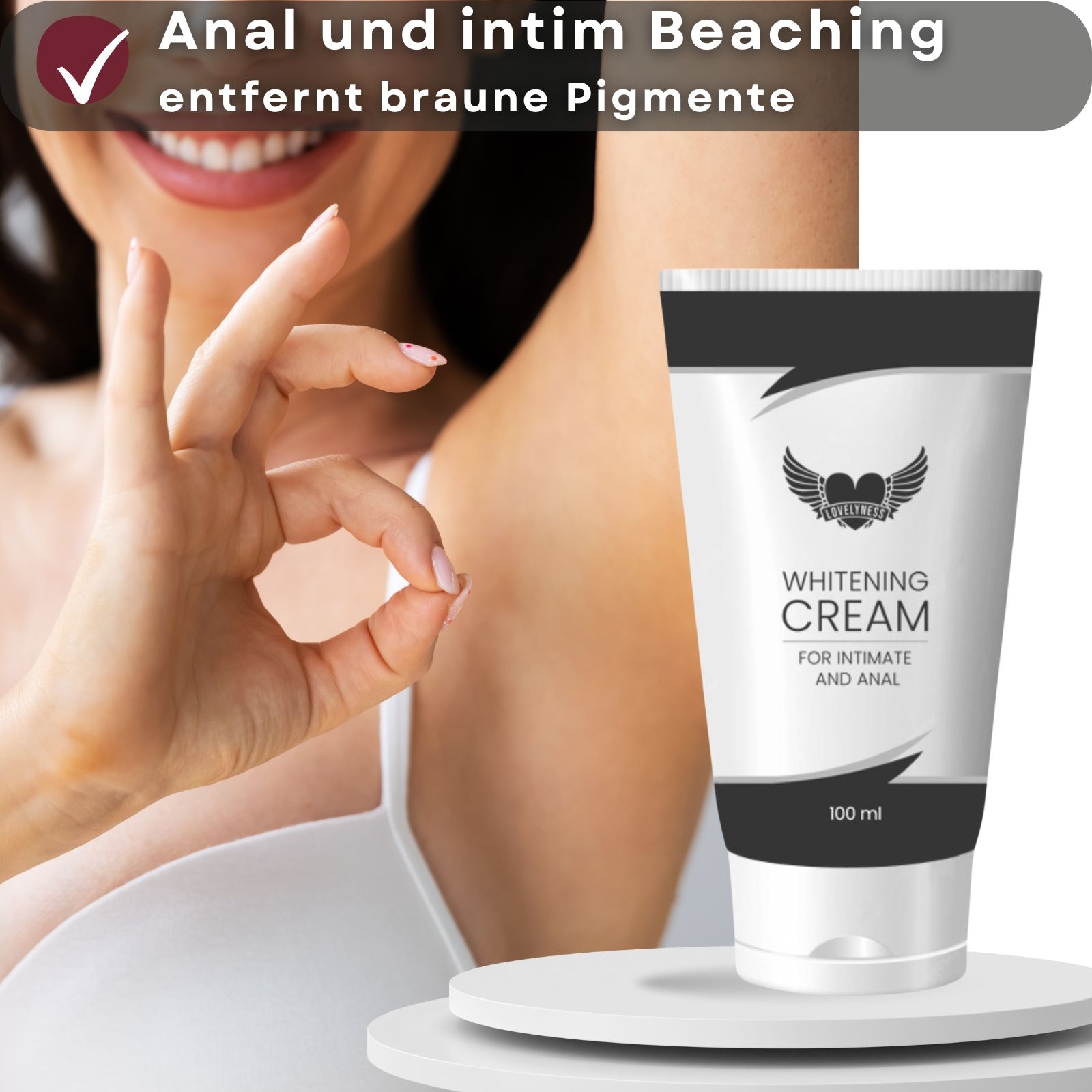 Weißes Creme-Tuben-Produkt. Text: Whitening Cream, For Intimate and Anal. 100 ml. Auf Podest.