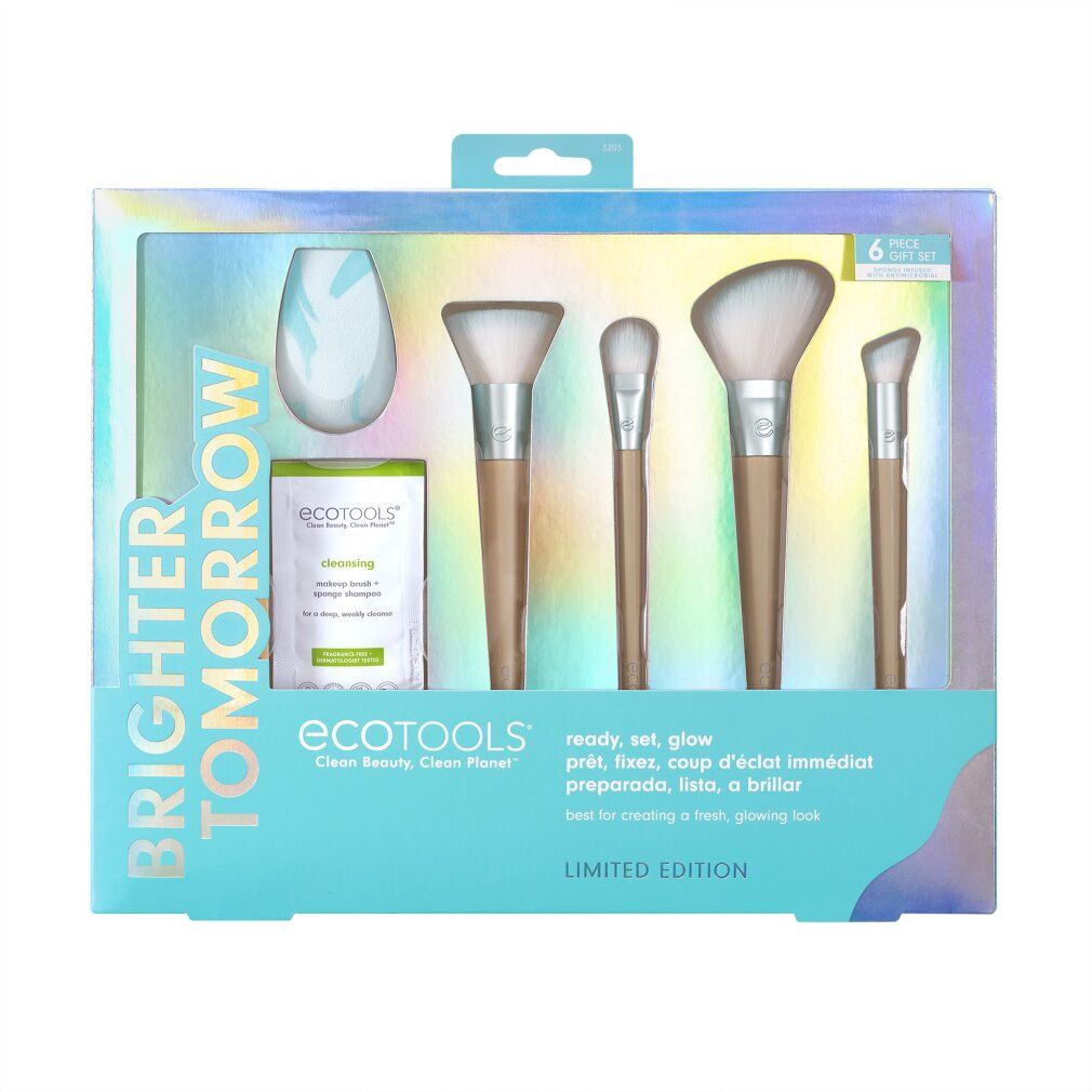 Geschenkset mit Make-up-Pinsel, Schwamm und Reinigungsprodukt. Verpackung mit Produktnamen und Aufschrift "Brighter Tomorrow".
