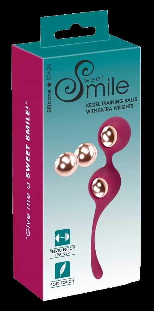 Verpackung mit zwei Kegel-Trainingskugeln und zwei separaten Kugeln. Aufschrift: Sweet Smile. Auf der Verpackung: Beckenbodentrainer, Soft Touch.