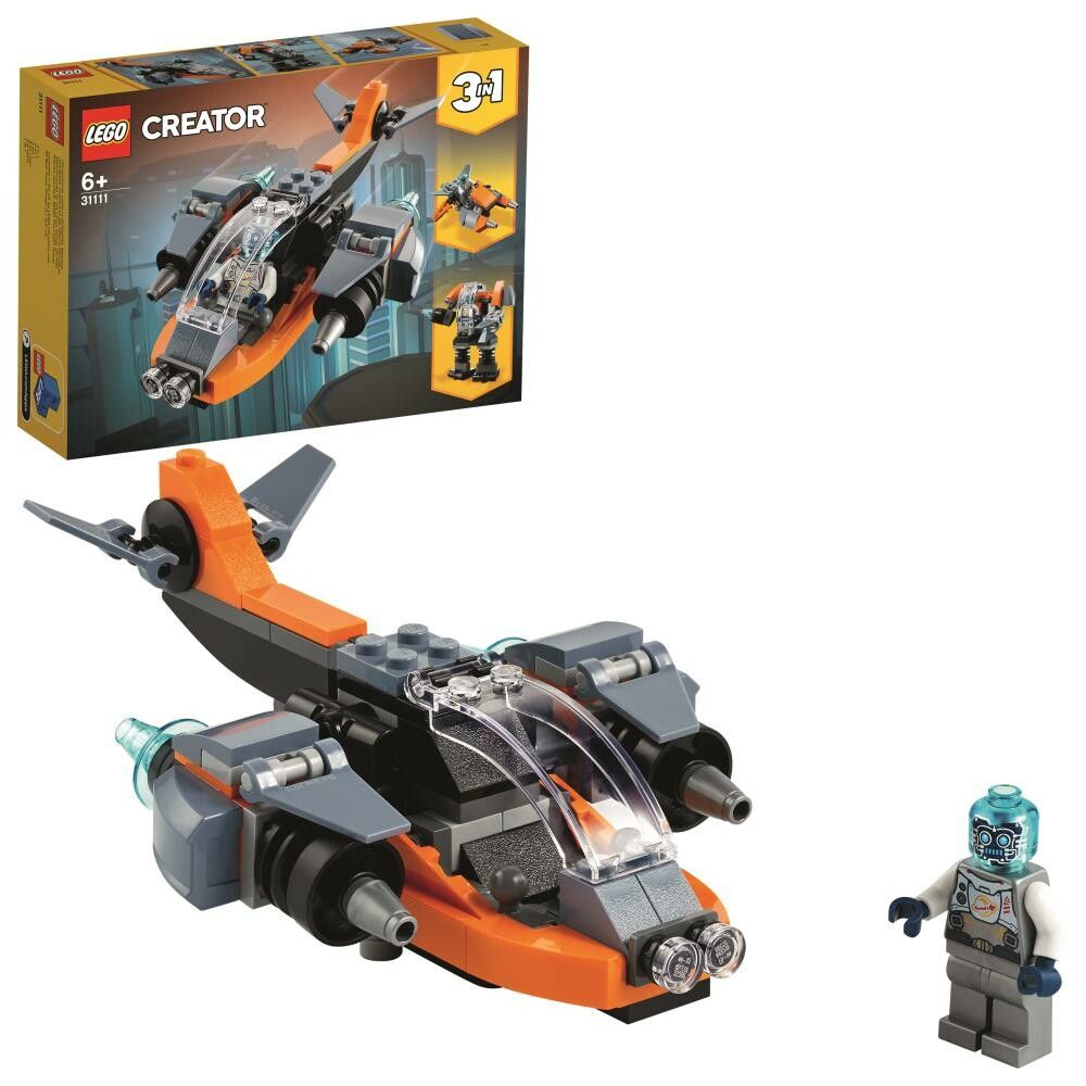 LEGO Creator Cyber-Drone. Il set include un modello di aereo arancione e grigio con cabina di pilotaggio trasparente e una minifigure. La confezione mostra il modello 3-in-1 e altre varianti di costruzione. Adatto a bambini dai 6 anni in su.