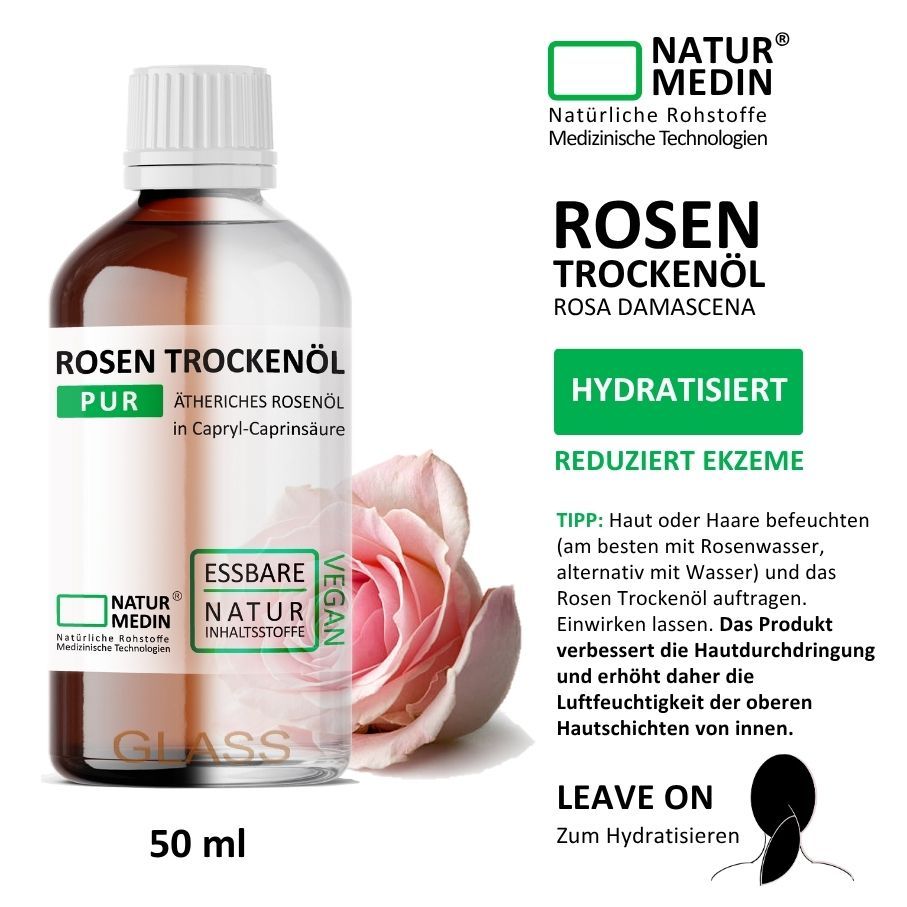 Glasflasche mit weißem Deckel. Etikett mit Produktnamen und Logo. Rose daneben. Text: NATURMEDIN, ROSEN TROCKENÖL, HYDRATISIERT, LEAVE ON.