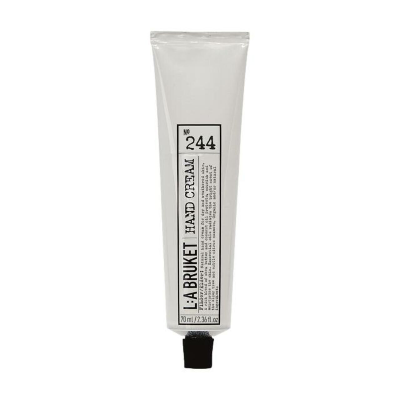 Creme-Tube, L:A Bruket, Hand Cream 244. Weiß, schwarze Schrift. Text: Hand Cream, 70ml/2.36 fl.oz. Schwarzer Verschluss.