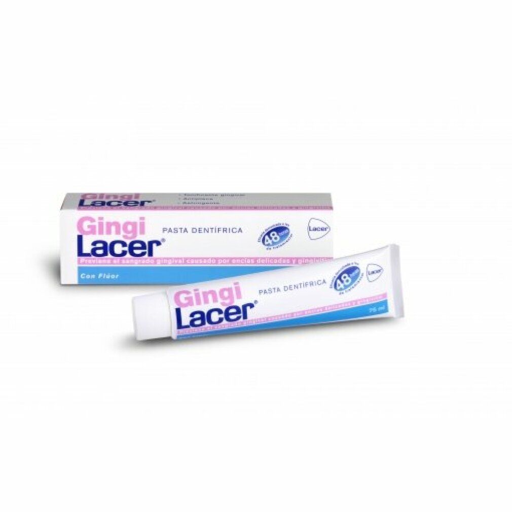 Zahnpasta-Tube und -Schachtel. Aufschrift: Gingi Lacer, Pasta Dentifrica. Enthält Fluorid. Rosa und weiße Verpackung.
