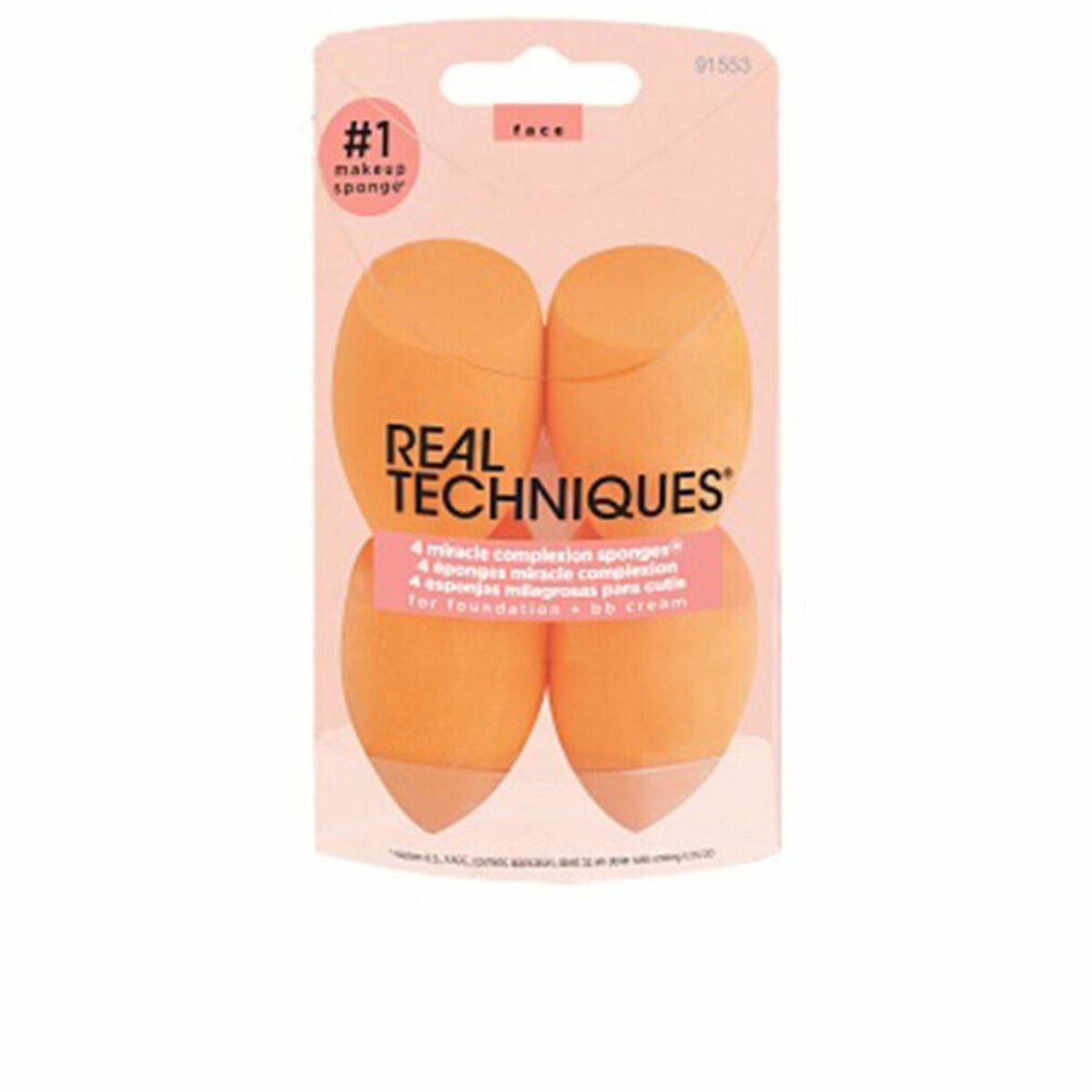 Verpackung mit vier orangefarbenen Schwämmen. Auf der Verpackung steht REAL TECHNIQUES.