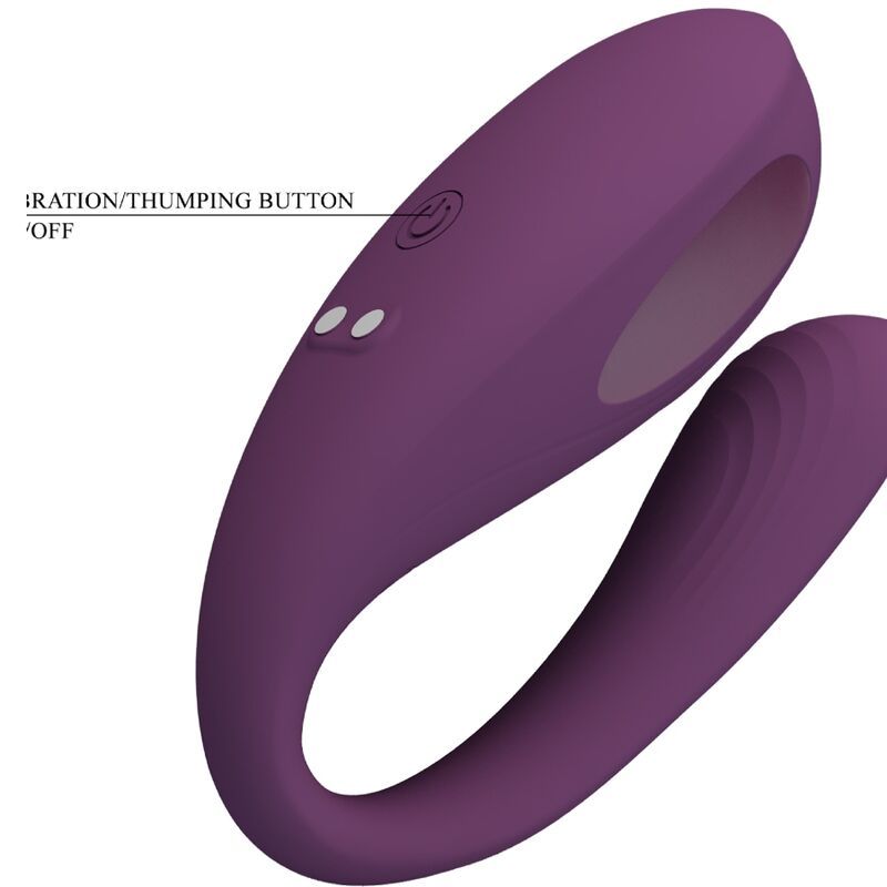 Lila Stimulator. U-förmig mit geriffelter Oberfläche. Ein/Aus-Knopf und zwei Knöpfe. Beschriftung: Vibration/Thumping-Taste.