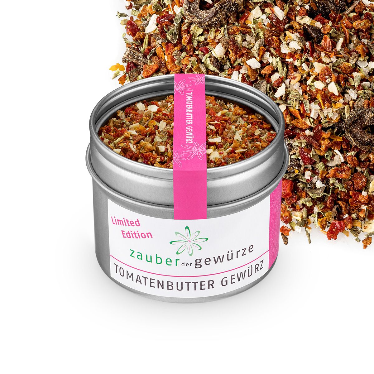 Geöffnete Metall-Dose mit Gewürzmischung. Rosa Etikett mit 'Zauber der Gewürze Tomatenbutter Gewürz' und 'Limited Edition'.
